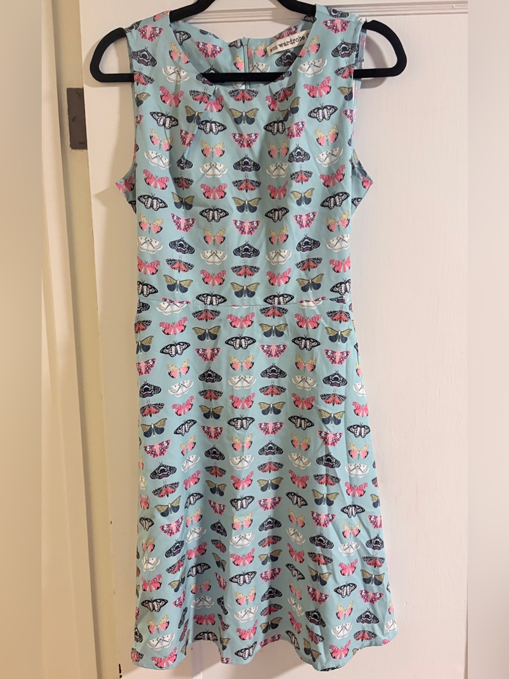 Sleeveless Light Blue Butterfly Print Midi Dress with Pockets and Tie in Back